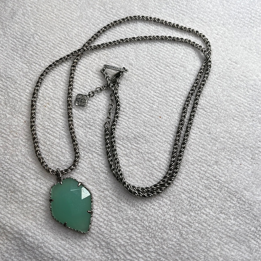 Long Kendra Scott necklace.